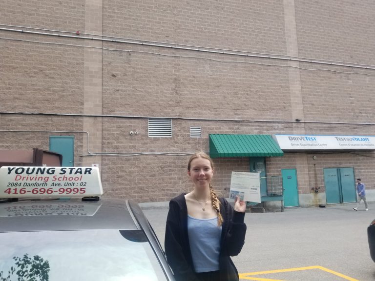 Happy graduate of our MTO-approved driving school curriculum in Thornhill.